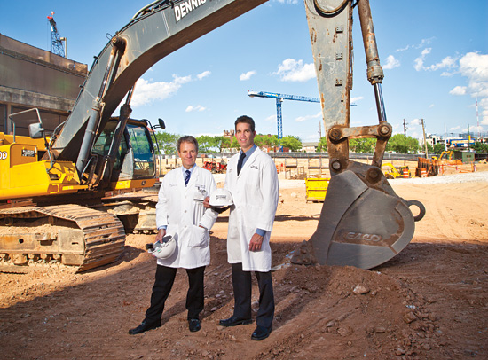 Radiation oncologists Ian Crocker and Tim Fox at the future site of the Emory Proton Therapy Center in Atlanta.